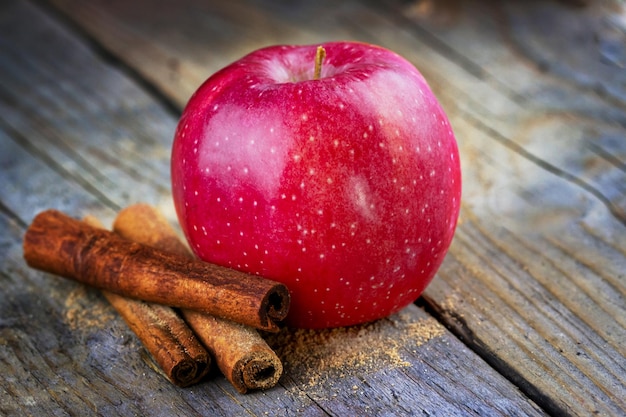 Apple with cinnamon sticks