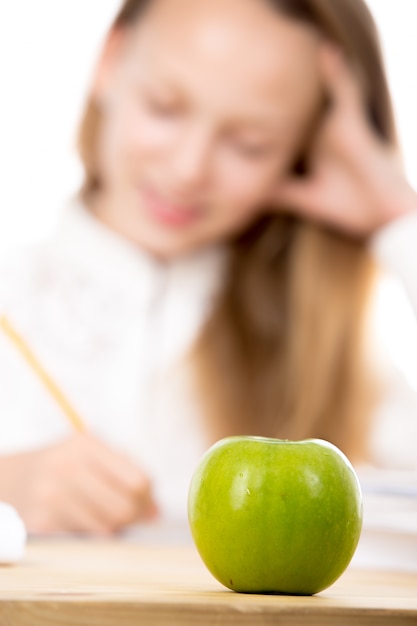 Photo apple with a girl unfocused background