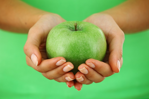 Apple in woman hands