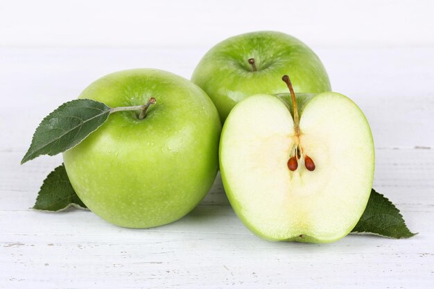 apples apple slice fruit fruits green on wooden board
