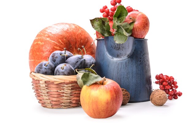 Photo apples in a garden jug and other fruits on a white background with soft shadow