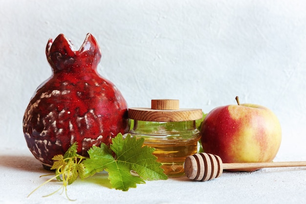 Apples and honey isolated close up