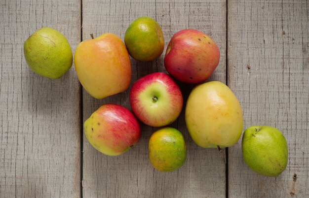 Apples and other on wooden.