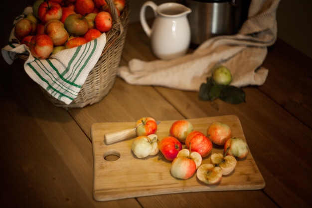 Apples on the table for a fresh juice making. Healthy nutrition concept.