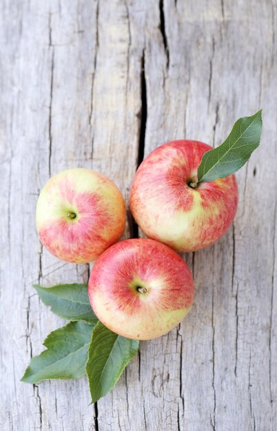 Apples on a wooden surface