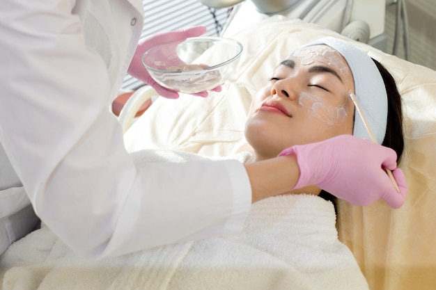 Applying Moisturizing Mask