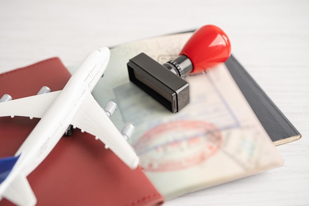 Approved Stamp visa and passport document to immigration at airport in country