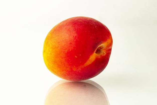 Apricot fruits and half Isolated on white background