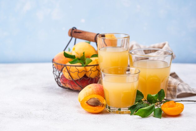 Apricot juice in glass. Healthy drink