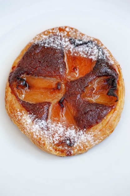 Apricot pie on a white background