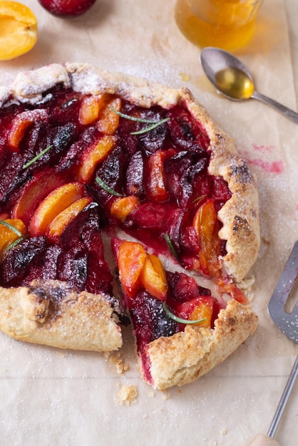 Photo apricot and plum homemade galette