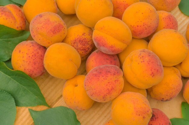 Apricot on wood background