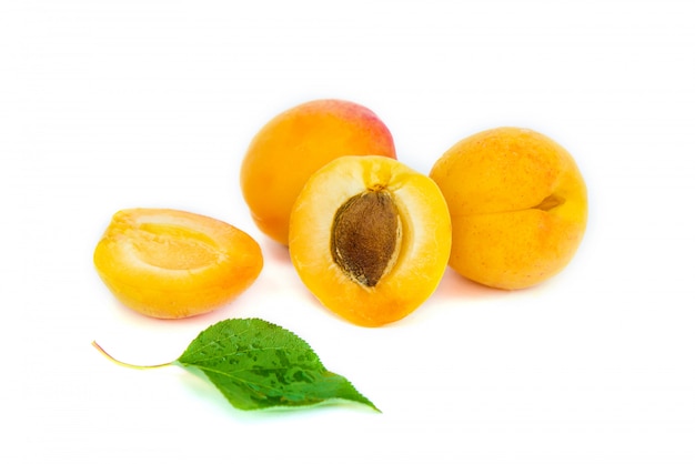 Apricots on a white background. Selective focus.