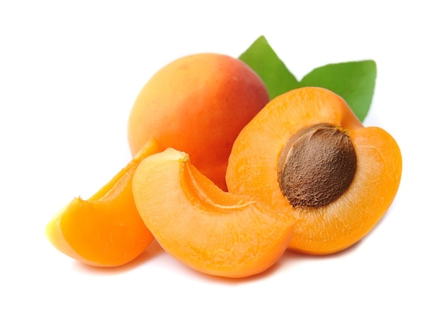 Apricots with leaves isolated.