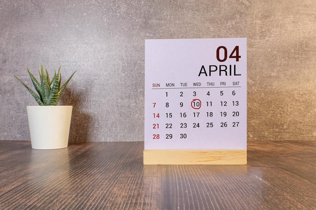 April 10 calendar date text on wooden blocks