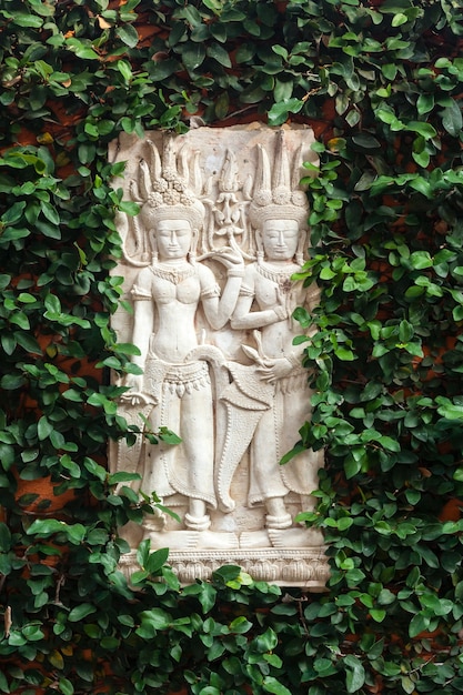 Apsara craft statue mimics Angkor's ancient art to decorate the garden.