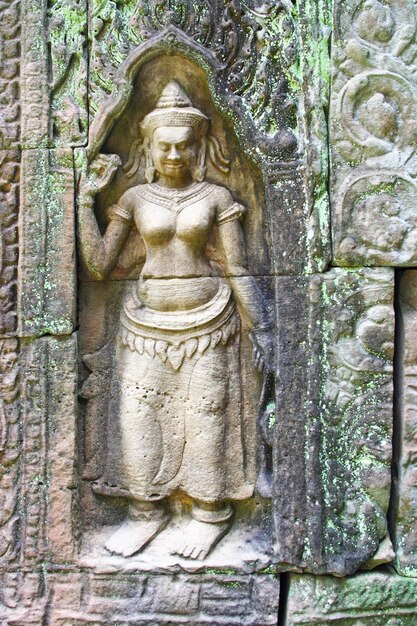 Apsara dancers carved on a wall of Ta Som in Siem Reap