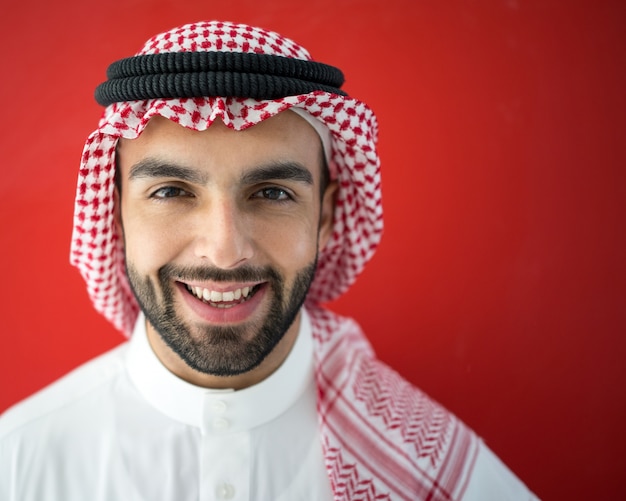 Arab man on red background