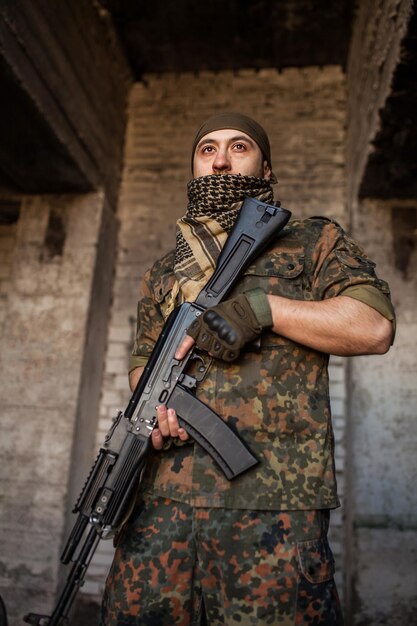 The Arab soldier with the AK-47 Kalashnikov assault rifle