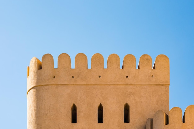 Photo arabian architecture details fortress with merlons