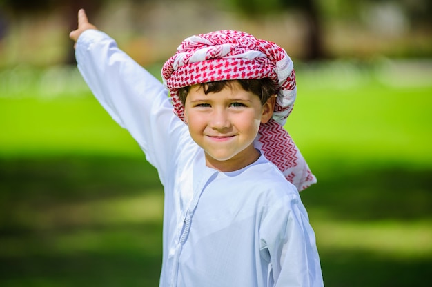 Arabian boy in the park.