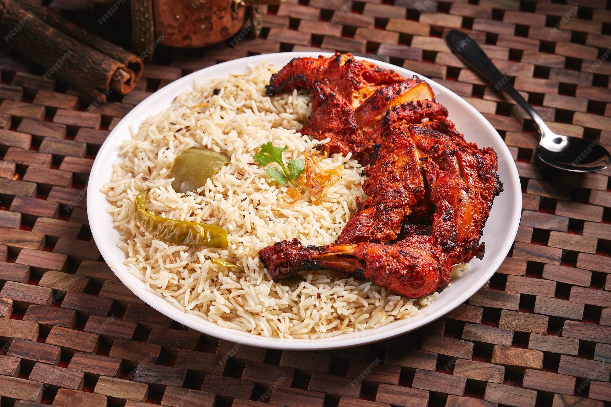 Premium Photo Arabian Chicken Lamb Mandi or biryani served in dish isolated on table side view