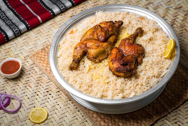 Arabian chicken mandi served in dish top view of middle east food