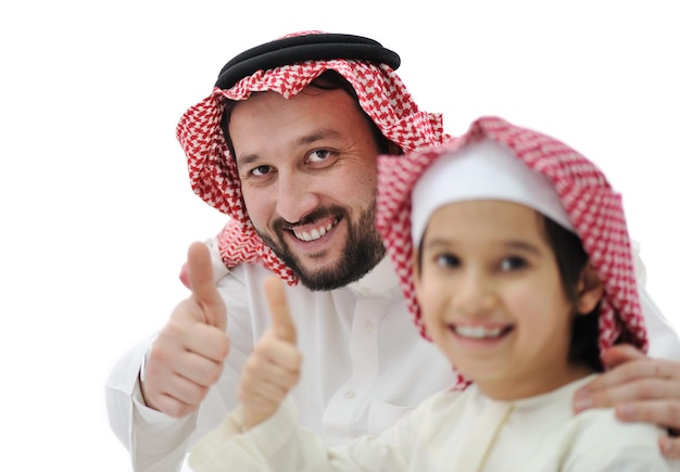 Arabian father and son with thumb up