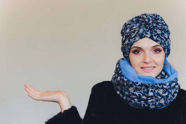 Arabian lady wearing Wool cap