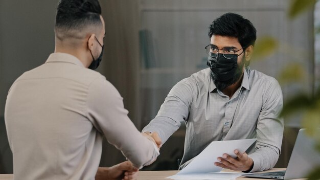 Arabian lawyer banker businessman hispanic man salesman analyst in medical mask consult sick client