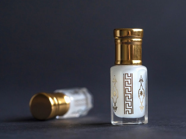 Arabian oud attar perfume or agarwood oil fragrances in mini bottles.