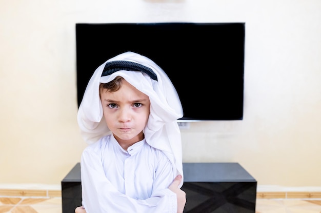 Arabic boy wearing traditional clothes