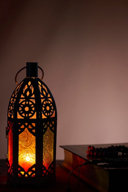 Arabic lantern and Holy Quran, Ramadan kareem background