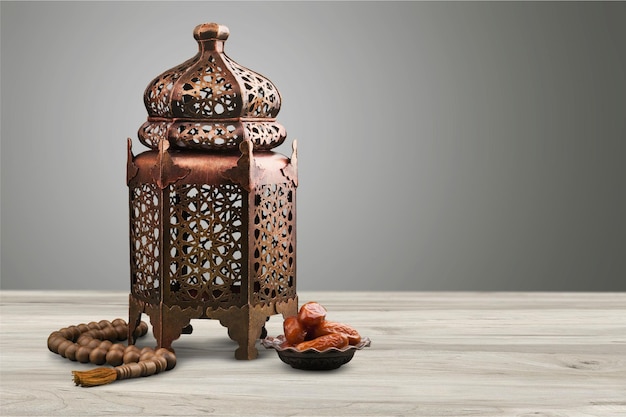 Arabic lantern and plate with date fruits