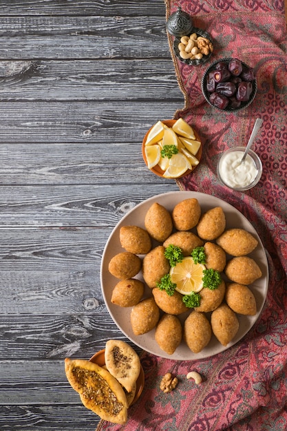 Arabic meat appetizer Kibbeh. Traditional Arabic kibbeh with lamb and pine nuts.