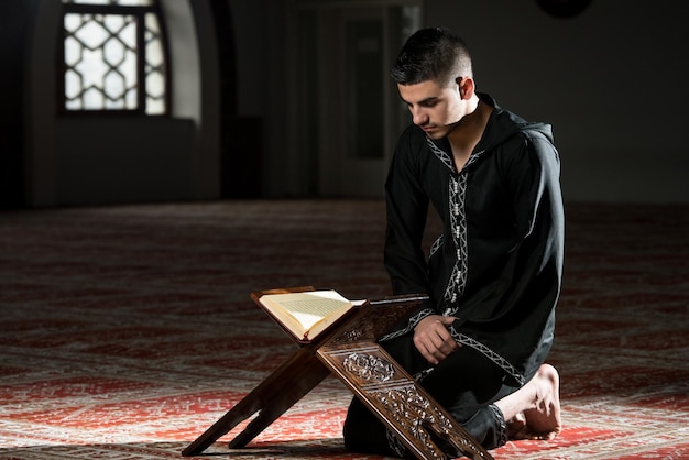 Arabic Muslim Man Reading Holy Islamic Book Koran