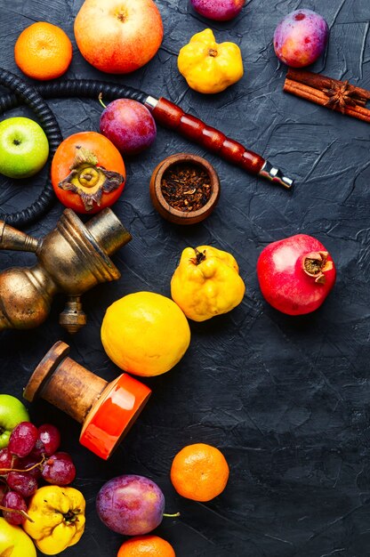 Arabic smoking hookah with apple,pomegranate,citrus and grape aroma.Modern hookah shisha