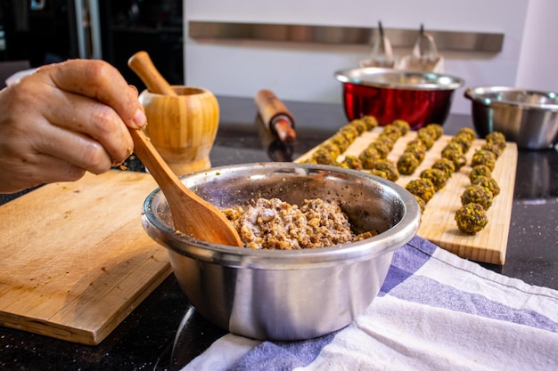 Arabic woman hands while preparing ingredients for keto kahk at home