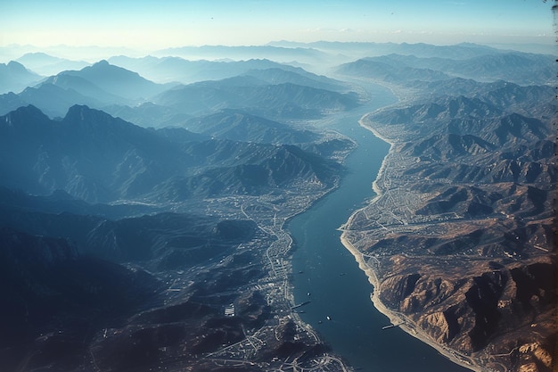 arafed view of a river running through a valley in the mountains generative ai