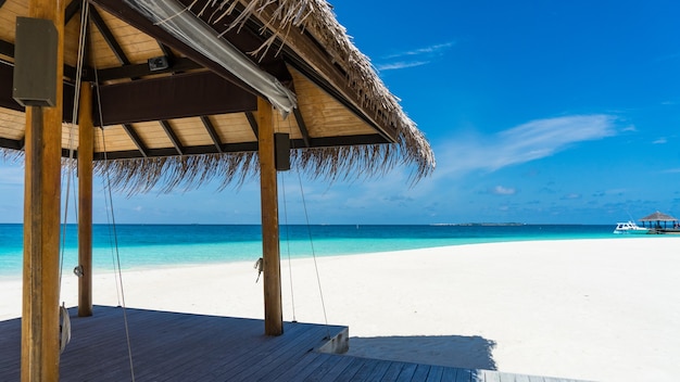 Arbor on the beach for rest. Sea, Maldives.