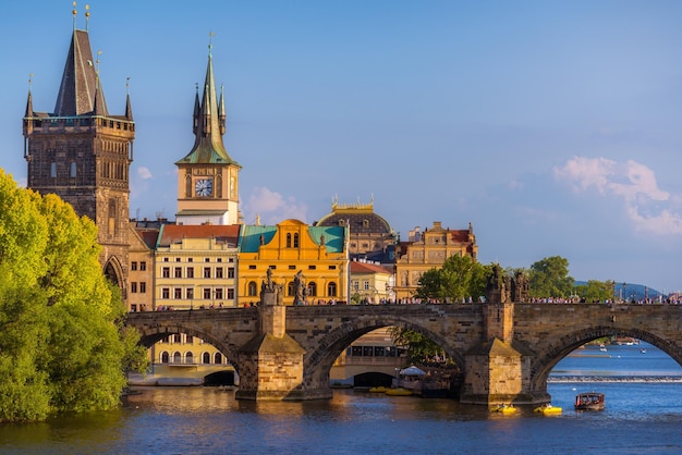 arch bridge over river against buildings