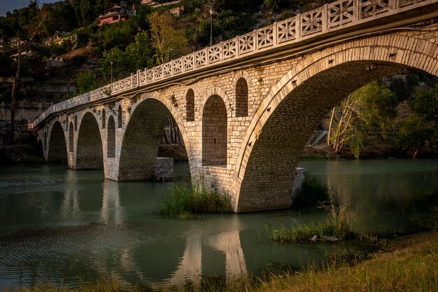 Photo arch bridge over river