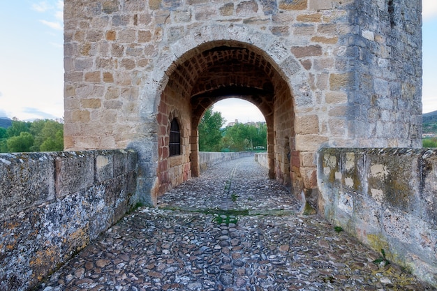 Arch in medieval stone walkway