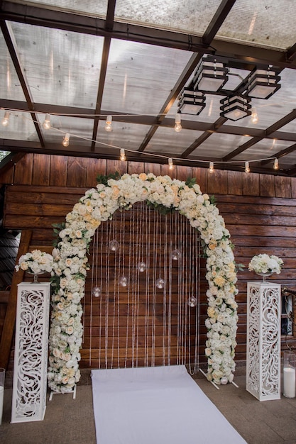 Arch for a wedding ceremony of flowers in the park