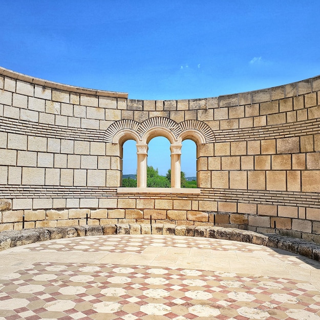 Archaeological tourism concept ancient roman atrium walls with mosaic floor