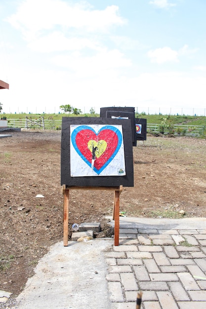 Archery target in the field. Love archery target.