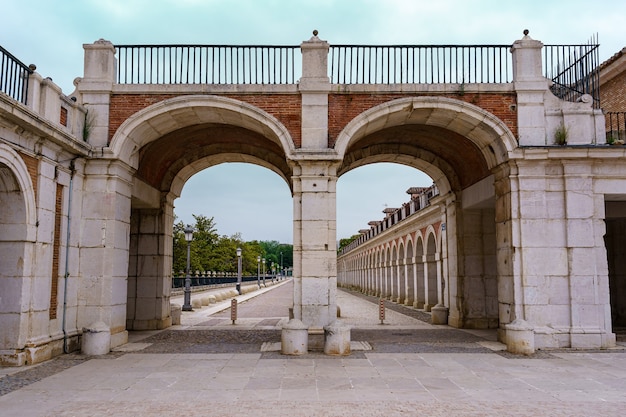 Arches and entrance doors to the royal palace of Aranjuez in Madrid