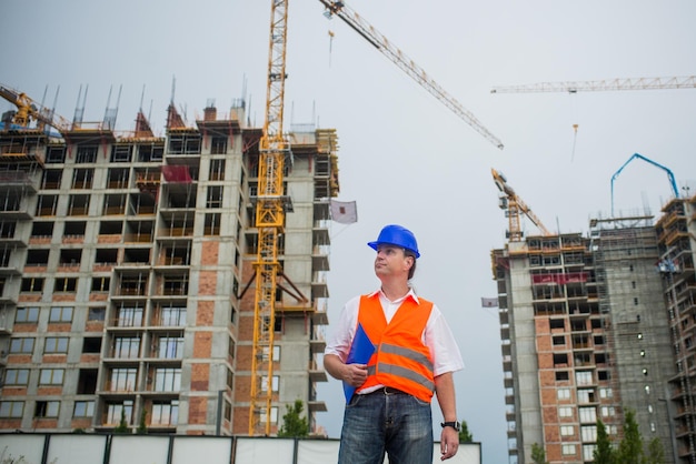 Architect on a construction site during a housing project