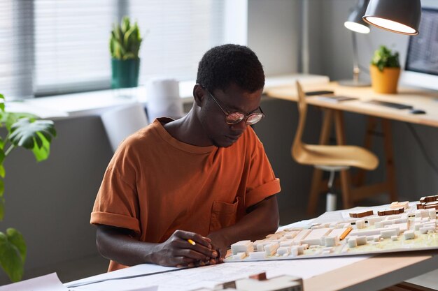 Architect working over new plan of construction