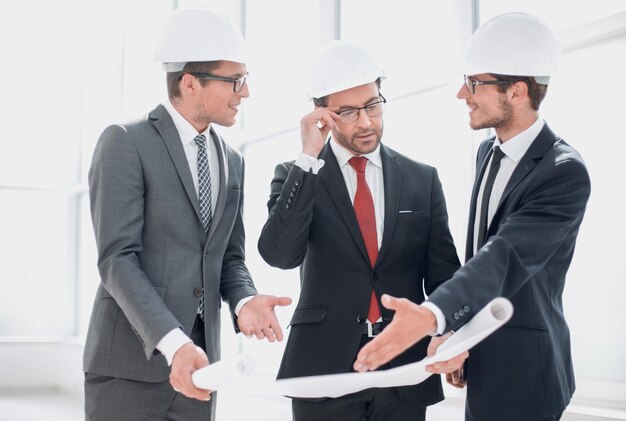 Architects discussing the design of the project